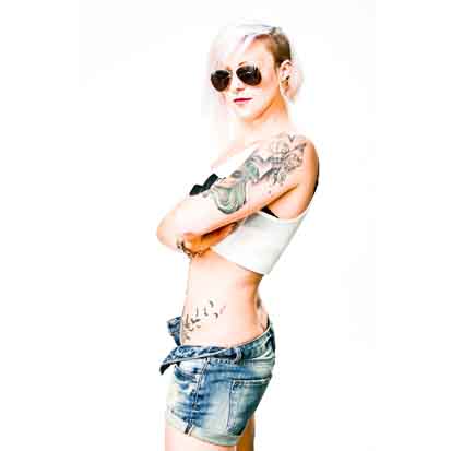 Portraitfoto Frau mit Tattoos